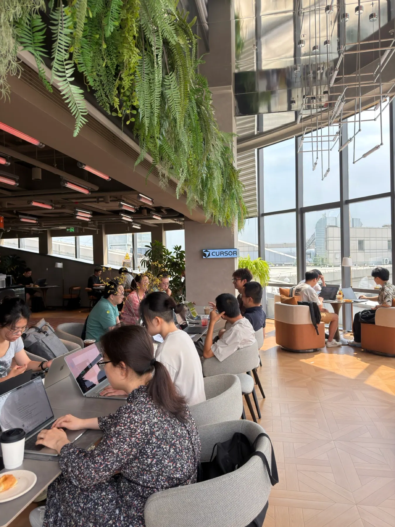 Developers building together at Cafe Cursor Beijing
